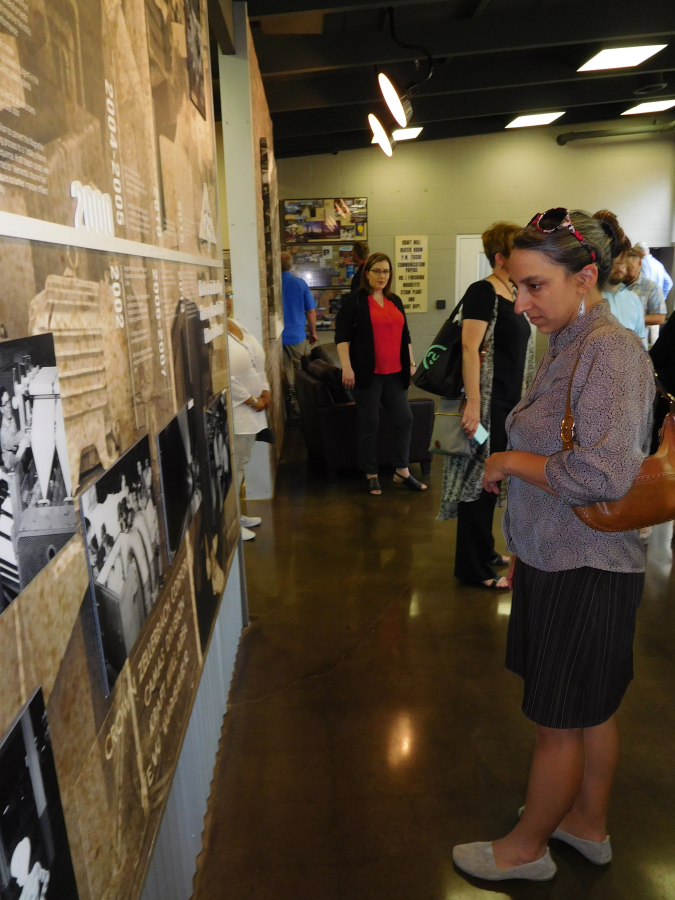 Area representatives stop at the Georgia-Pacific paper mill interpretive center in downtown Camas, during the Columbia River Economic Development Council&#039;s Main Street Day, July 13. The interpretive center, located at 401 N.E.