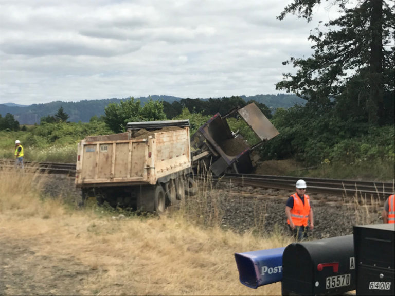 A view of the July 19 truck crash onto the Burlington Northern Santa Fe (BNSF) railroad tracks near the Washougal rock pit. The truck driver was hauling mined materials from the Washougal quarry and lost control of his brakes on a steep hill.