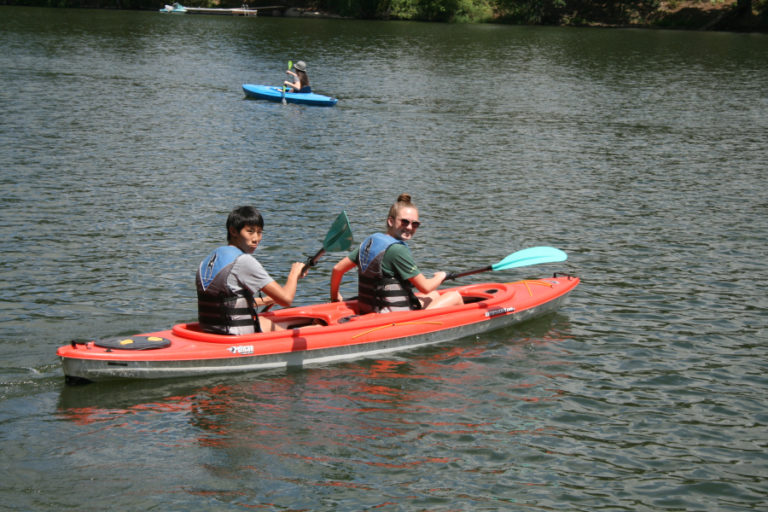 Shun Yanaguchi and Maddy Hill enjoy their first ever paddle trip on Lacamas Lake.