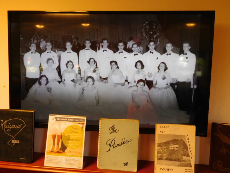 Historic photos and yearbooks decorate the interior of Columbia Ridge Senior Living, in Washougal, during the Senior Prom, Thursday, July 26.