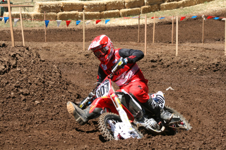 A top pro displays his extreme skill in a deep rutted turn during media day at Washougal National on Friday, July 27.