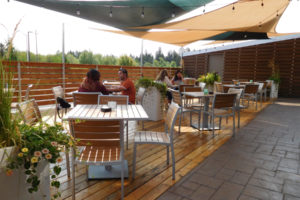 Diners enjoy lunch on the patio at The Hammond Kitchen + Craft Bar, in Camas. The restaurant also serves brunch, dinner and "social hour."