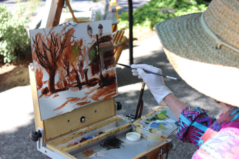Artist Cheryl Mathieson paints a downtown Camas scene during the 2017 Plein Air art event. This year&#039;s event brings &quot;en plein air&quot; artists back to Camas&#039; downtown streets on Friday, Sept. 7. The artists&#039; work will be displayed at Camas Gallery that evening, during the September First Friday festivities, and auctioned off Saturday, Sept. 8, at the Dinner in White on the Columbia fundraiser.