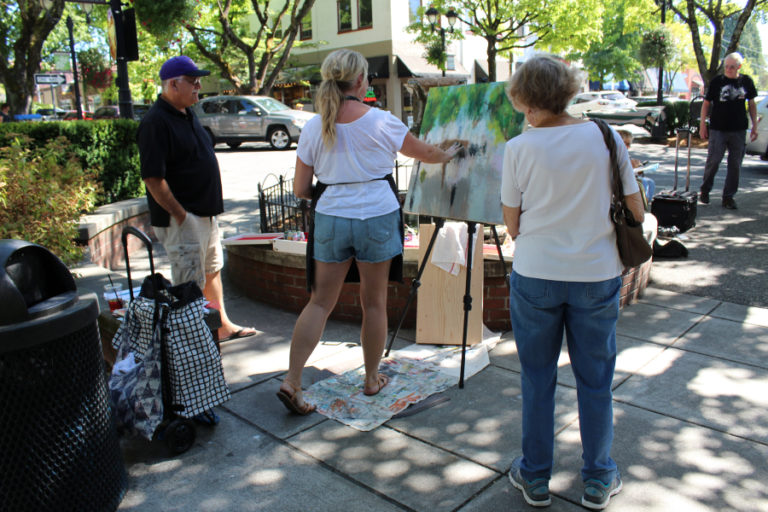 Visitors watch artist Heidi Curley paint during the 2017 Plein Air art event. Come see artists creating &quot;in the open air&quot; at this year&#039;s event, held throughout the day, Friday, Sept. 7, in historic downtown Camas.