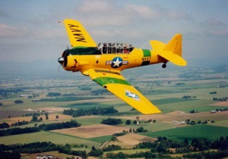 Camas-Washougal Aviation Association President Kent Mehrer flies one of the historic World War II planes built by the Stearman Aircraft Corporation he inherited from his late father, Skeets Mehrer, who owned 15 Stearmans.