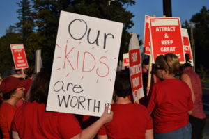 Washougal School District teachers picket outside a school board meeting at the district office in August 2018. Two years later, the district and its teachers' union were able to reach a bargaining agreement without need for mediation or arbitration for the first time in at least 10 years. (Post-Record file photo)