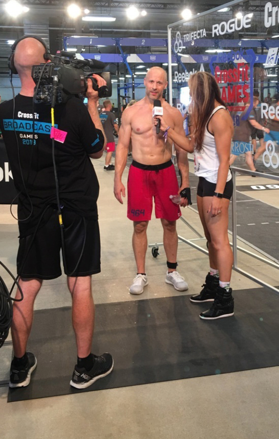 Washougal insurance agent Nathan Loren is interviewed after finishing third in the International Crossfit Games in Madison, Wisc.