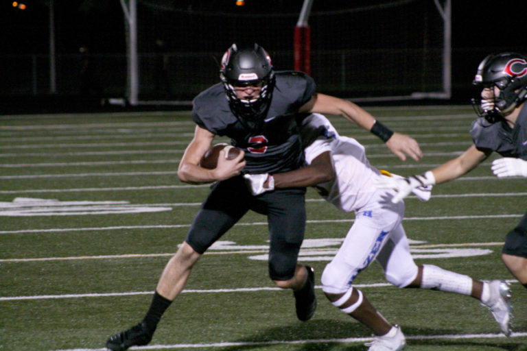 Camas sophomore quarterback Jake Blair breaks a tackle.