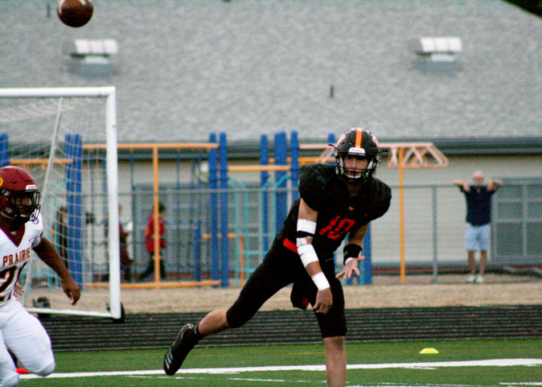 Panther quarterback Dalton Payne tosses a spiral against Prairie High School at Fishback Stadium on Friday, Sept.