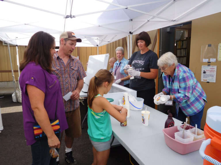 Heritage Day volunteers (left to right) Lois Cobb, Rebecca Bohlin and Geri Beck serve root beer floats Sept. 8, at the Two Rivers Heritage Museum, in Washougal. Hot dogs, ice cream sundaes and lemonade were also available to purchase.
