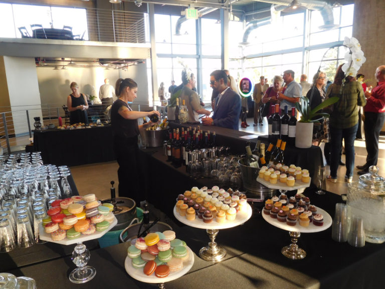 Attendees of a Sept. 26, VIP opening of the Black Pearl Event Center, in Washougal, enjoy drinks, desserts and appetizers.