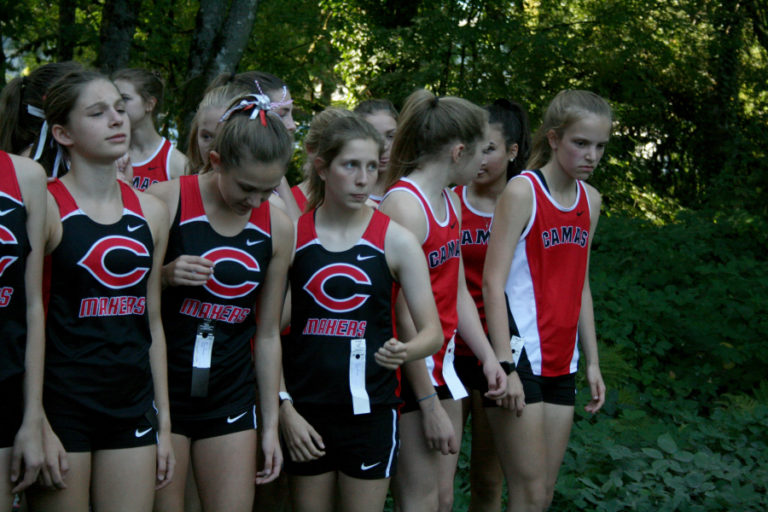 Aspen Ashcroft (third from left) concentrates seconds before the horn during a race against Union High Sept. 25, at Round Lake.