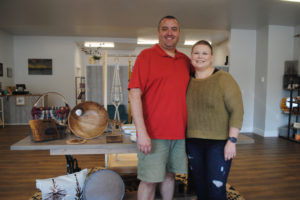 Tyson Morris (left) and Lori Lander (right), co-owners of Artful Attic, at their soon-to-open shop in downtown Camas on Oct. 4. The couple is engaged and set to be married next year.