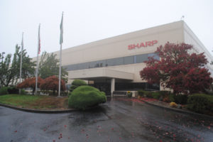 The Sharp Microelectronics building at 5700 N.W. Pacific Rim Blvd. on Oct. 8. The facility is now for sale at a listed price of $17.95 million 