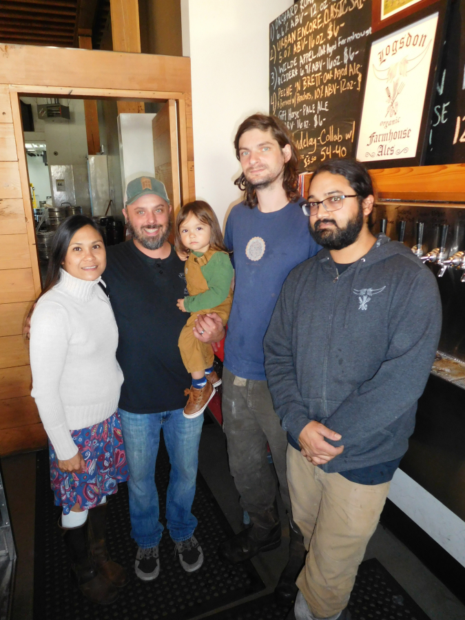Logsdon Farmhouse Ales owners Jodie Ayura and John Plutshack (with their son, Tucker), along with brewer Mark Pearson and head brewer Shilpi Halemane (from left to right) are celebrating the relocation of most of the company&#039;s operations from Hood River, Ore., to downtown Washougal. Alex Smokehouse soups, salads and sandwiches are served, along with Logsdon beer, in the tap room.