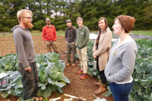 Alex Yost, a Washougal City Council member and co-owner of OurBar restaurant in downtown Washougal, (right) tours Shady Grove Farm, in Fern Prairie, with other members of 'Shougfood,' Oct. 9. They are interested in opening a co-op grocery store in downtown Washougal. 