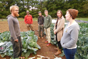 Alex Yost, a Washougal City Council member and co-owner of OurBar restaurant in downtown Washougal, (right) tours Shady Grove Farm, in Fern Prairie, with other members of 'Shougfood,' Oct. 9. They are interested in opening a co-op grocery store in downtown Washougal.