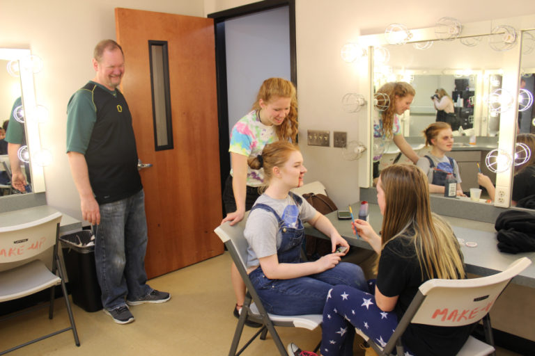 Washougal High School (WHS) drama teacher Kelly Gregersen (left) laughs with students Tori Corkum (second from left), Emma Free (second from right) and Aubrey Turner (right) during a prop-building day for the WHS drama department&#039;s 2018 haunted house on Oct. 20.