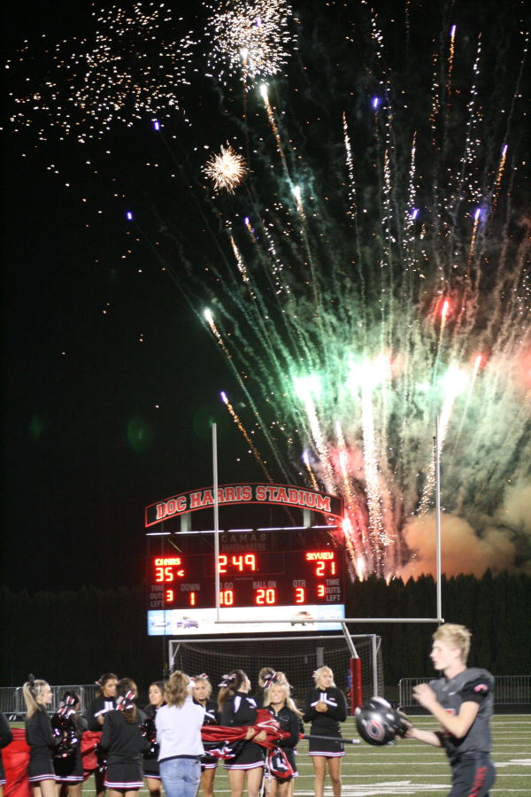 Fireworks greet Camas football players after a halftime show during the Papermakers&#039; Oct.