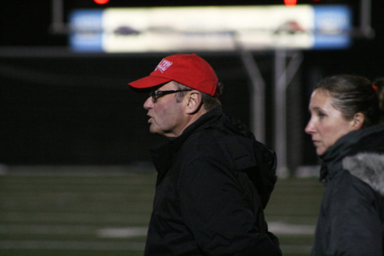 Camas head soccer coach Roland Minder and assistant coach Keri Tomasetti on the sidelines against Union, Oct. 23.