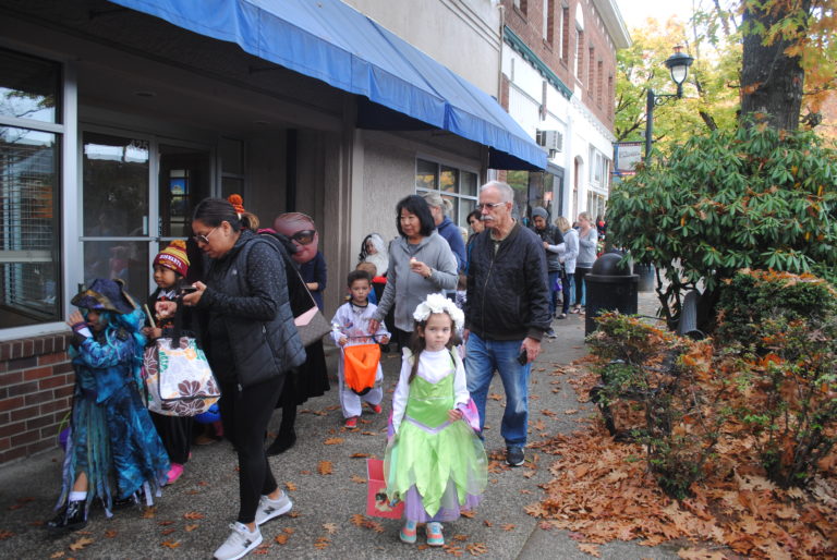 Trick or treaters gather candy outside the Camas-Washougal Post-Record office for Boo Bash on Oct. 24.