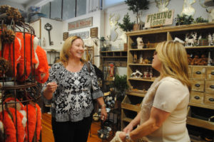 Camas' new mayor, Shannon Turk (left), chats with Kristen Danis at Camas Antiques on Oct. 16. 