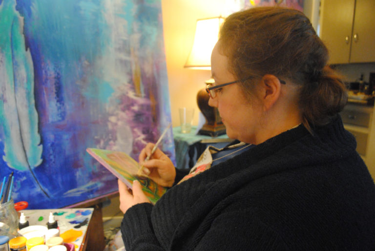 Anni Furniss at work in her living room on Nov. 3. It was her first year participating in Clark County Open Studios.