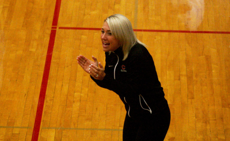 Camas head volleyball coach Michelle Ford pumps up her team during a tense, five-game match against Skyview High. After losing this seeding match in five games, the Papermakers won their first two matches at Skyview, punching their way to the state tournament.