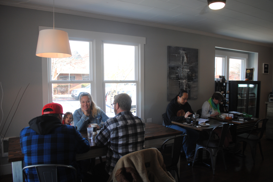 Patrons gather at Hidden River Roasters on a Tuesday morning in November. The Camas coffee shop won an award for most improved interior from the Downtown Camas Association.