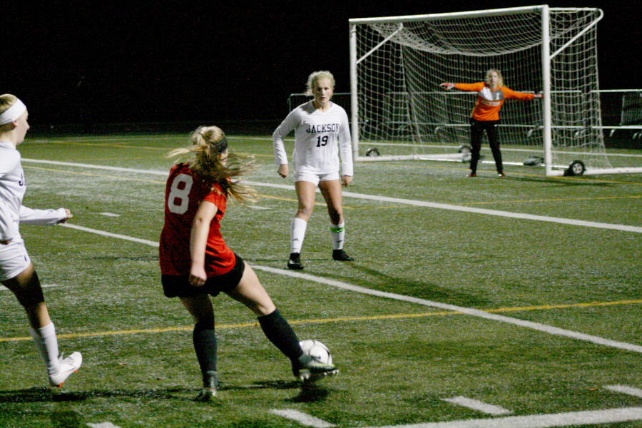 Jazzy Paulson sets up a scoring play against Jackson during one of the last home games of her high school career at Doc Harris Stadium.