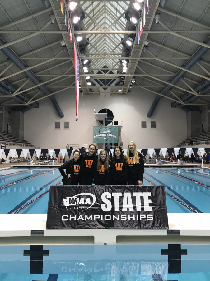 Washougal's 200 relay team celebrates a 15th place state finish.  (from left to right) Kyra Schmid, Charlotte Baker, Lily Seitz, Kaylyn Schmid, Merritt Jones. (Photo courtesy Debbie Schmid)