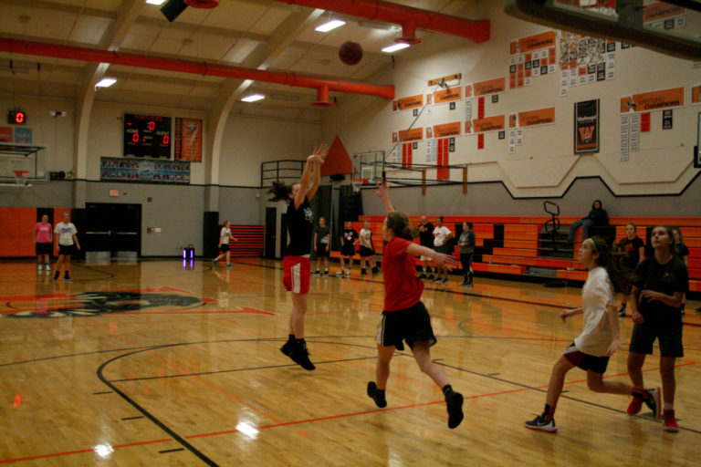 Beyonce Bea pops a mid range jumper during one of the first high school practices of her senior season.