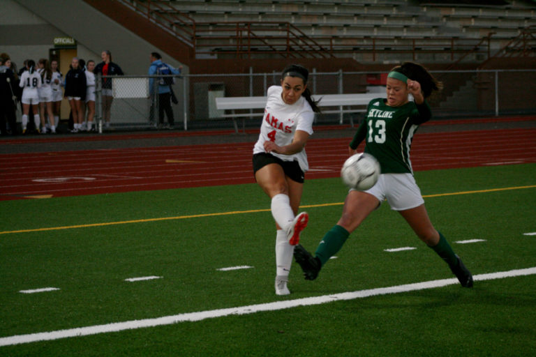 The Papermakers&#039; Maddie Kemp, fires a shot on goal from long range that just misses during the state finals, Nov. 17.