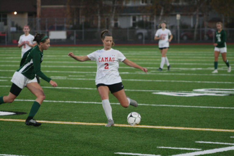 Papermaker Callie Rheaume (2) starts a fast break against Skyline in the state title game, Nov.