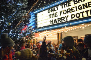 Parents and children reach for the "snow" that fell down during the 2017 Hometown Holidays and Christmas tree lighting celebration in downtown Camas. (Post-Record file photo)