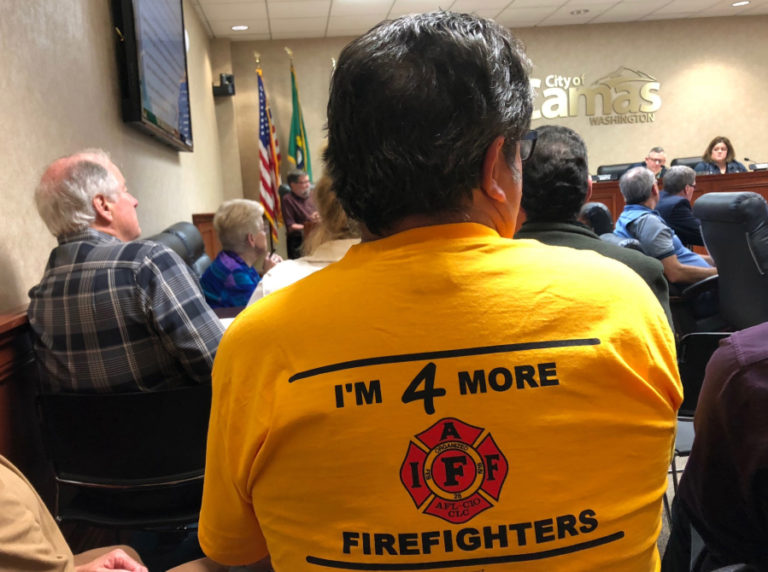 Local firefighters turned out for Camas City Council meetings throughout the spring and summer months, often wearing &quot;I&#039;m 4 More Firefighters&quot; shirts like the one pictured here, to tell city leaders they believe the Camas-Washougal Fire Department is severely understaffed.