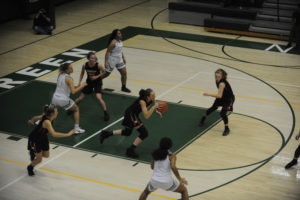Beyonce Bea with one of her seven steals against Evergreen High School in the season-opener.