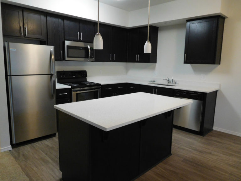 The kitchens in Main Street Village, a new apartment complex near downtown Washougal, have quartz countertops and stainless steel appliances.