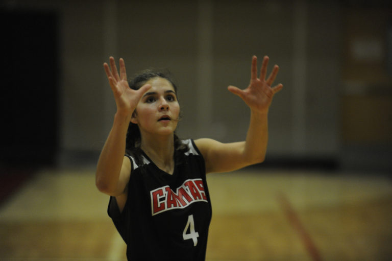 Senior Regan Cooke calls for a pass during a drill at practice in the Camas gym.