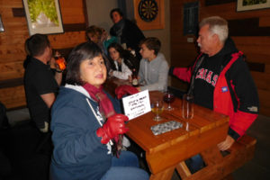 Estelle Monaghan (left) reveals her team's answer for a "How the Grinch Stole Christmas!"-related question during a Dec. 5 trivia night at 54?40' Brewing Company, in Washougal. 54?40' hosts a trivia night with the Washougal Community Library, at 6 p.m., on the first Wednesday of the month. 