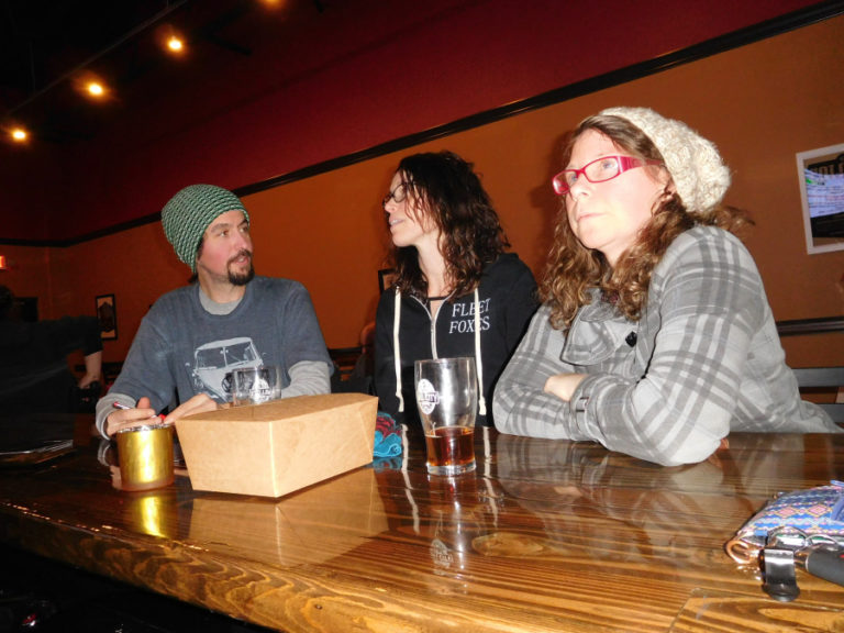Marcus Keeler, Debbie Benecke and Amanda Keeler (from left to right) form the team, &quot;Dirty Bathwater,&quot; during the Dec. 5 trivia night at Mill City Brew Werks, in Camas.