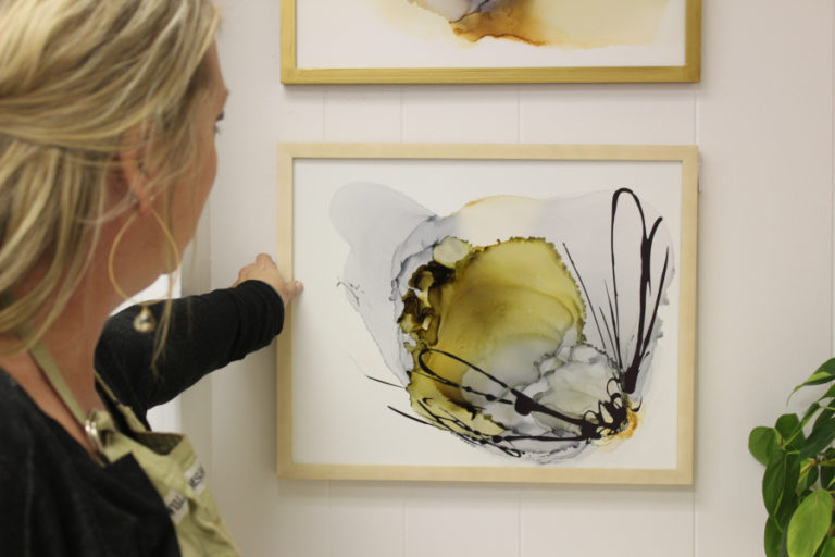 Camas artist Heidi Jo Curley explains the process of alcohol ink, which she used to make this abstract painting, which she thinks looks like a bee.