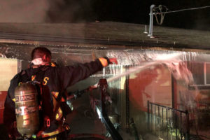 (Contributed photo courtesy of the Camas-Washougal Fire Department)
Camas-Washougal firefighters respond to a garage fire on the 4000 block of “C” St., in Washougal, at 5:30 a.m., Thursday, Dec. 13. The occupants evacuated without injuries.