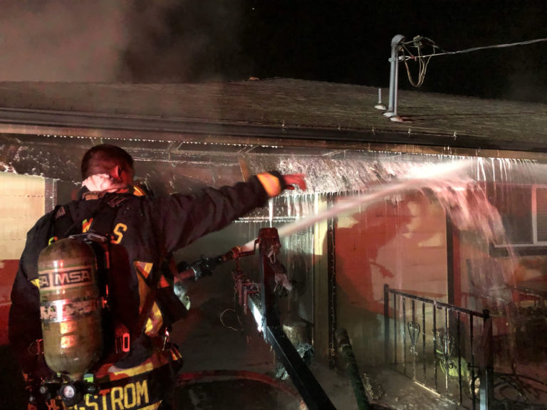 (Contributed photo courtesy of the Camas-Washougal Fire Department)
Camas-Washougal firefighters respond to a garage fire on the 4000 block of “C” St., in Washougal, at 5:30 a.m., Thursday, Dec. 13. The occupants evacuated without injuries.