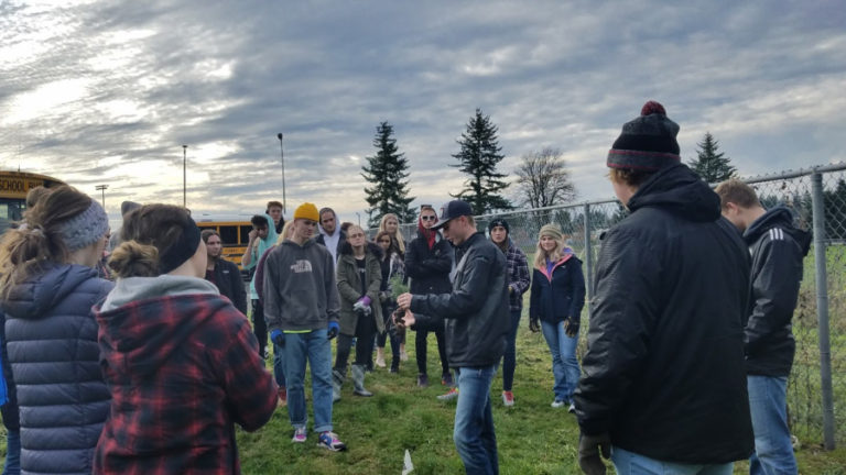 Camas High students gather during a tree planting event held Dec.