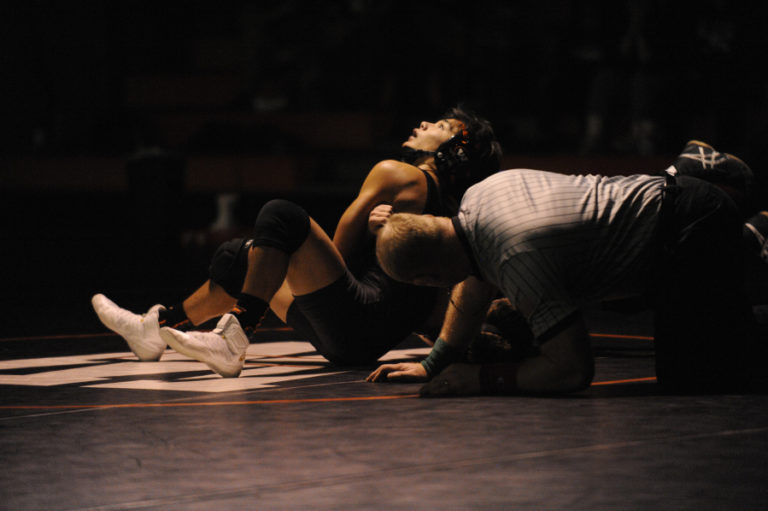 Washougal Panthers&#039; team captain, senior Jason Powell, goes for a pin against Spencer Little from Columbia River. Powell went to state last season and hopes to bring home a trophy this season.