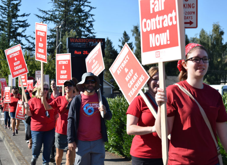 Washougal teachers walk the picket line during a strike in August 2018. The school district and its teachers' union are closing in on a contract for 2020-21, but say there are still issues to resolve -- including concerns about COVID-19 safety precautions.