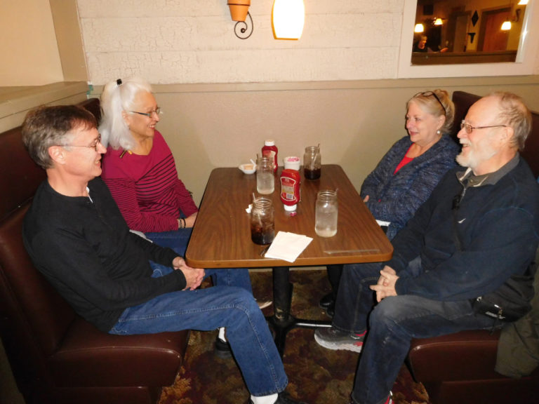 Gayle Godtlibsen and her husband, Ivar Godtlibsen (left), of Washougal, talk with longtime friends, Colleen and Bruce Becker (right), of Vancouver, after lunch at Heller&#039;s Restaurant and Lounge, in Washougal, on Friday, Dec. 28.