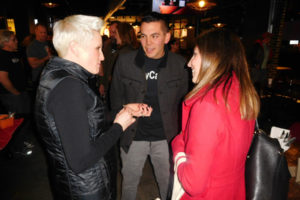 Amanda Brinkman, the chief brand and communications officer at Deluxe Corporation (left), talks with Nick and Tami Calais during a reception for representatives of the online show, 