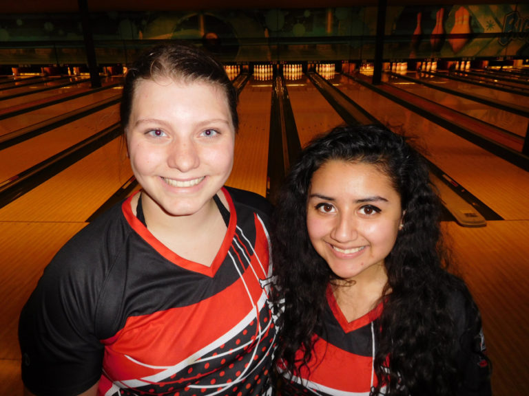 Camas High School seniors Samantha Voogt (left) and Eva Brizuela (right) serve as co-captains of the Camas bowling team. The Papermakers have a winning record heading into the postseason.
